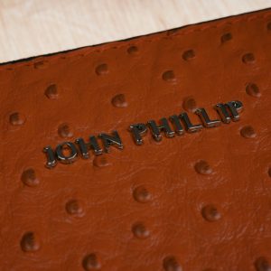 Leder Clutch Tasche Strau Cognac